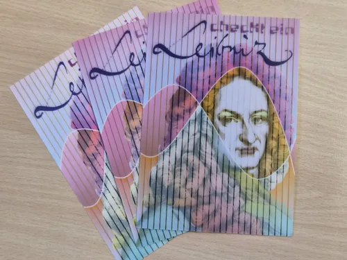 Drei Postkarten mit identischem Leibnizmotiv.